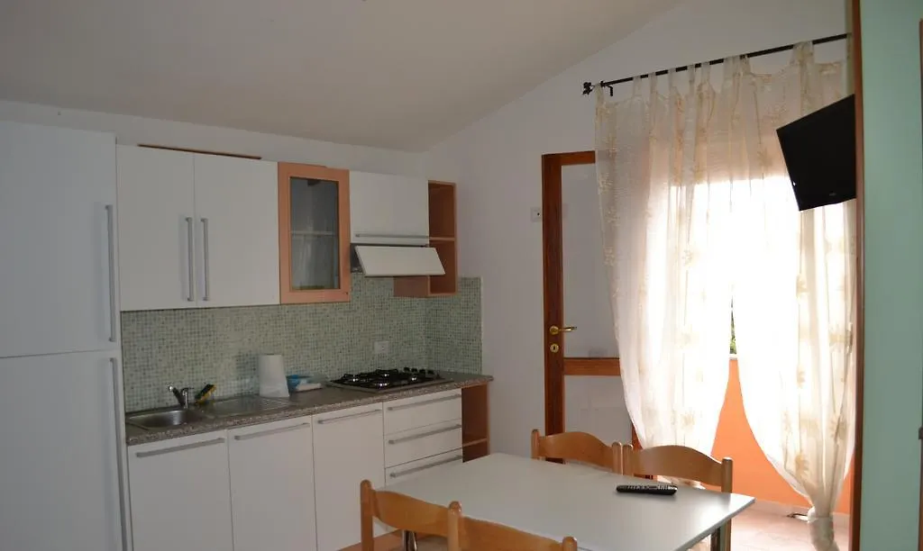 Apartments Mimose باديسي